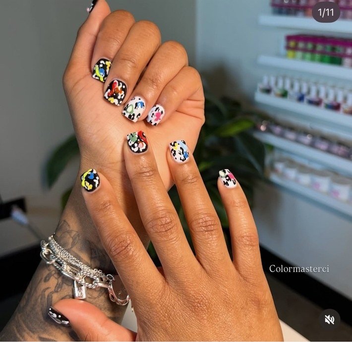 Colorful patterned nail art created by CiCi