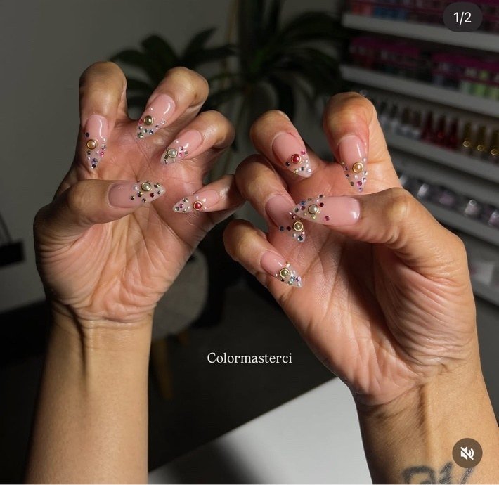 Pink jeweled nail art by CiCi